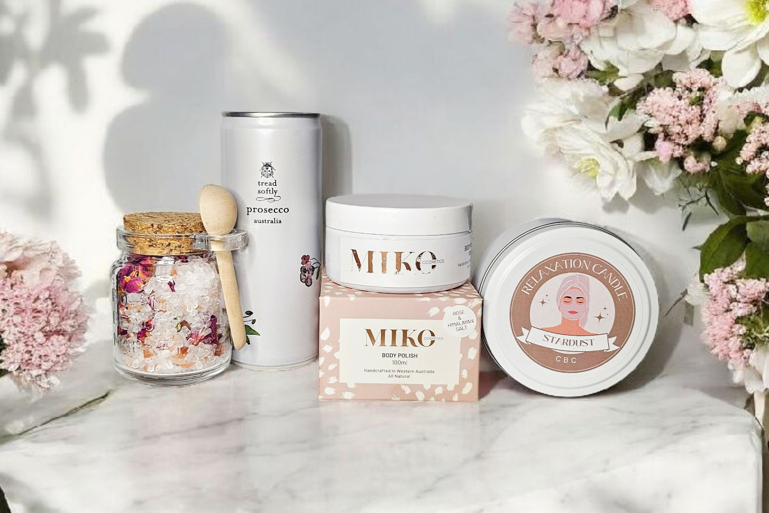 Self Care Gift Box featuring Tread Softly Prosecco, Stardust candle, MIKO body polish, lavender and rose bath soak and chocolates from Confetti Box Co