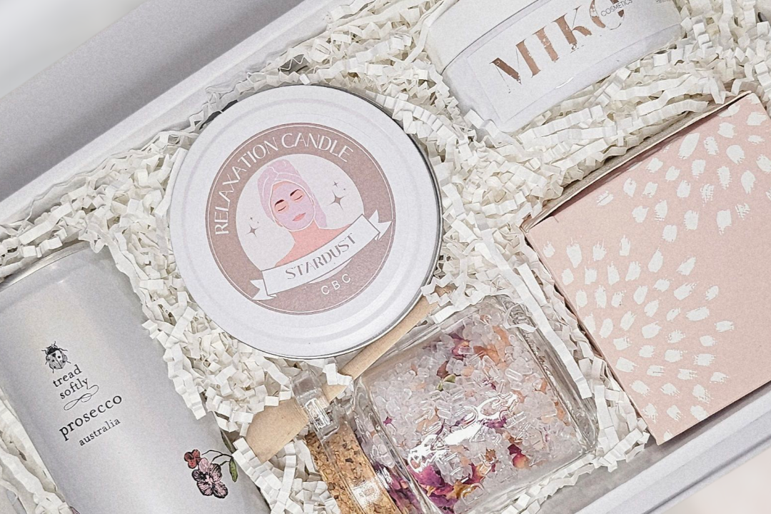 Self Care Gift Box featuring Tread Softly Prosecco, Stardust candle, MIKO body polish, lavender and rose bath soak and chocolates from Confetti Box Co