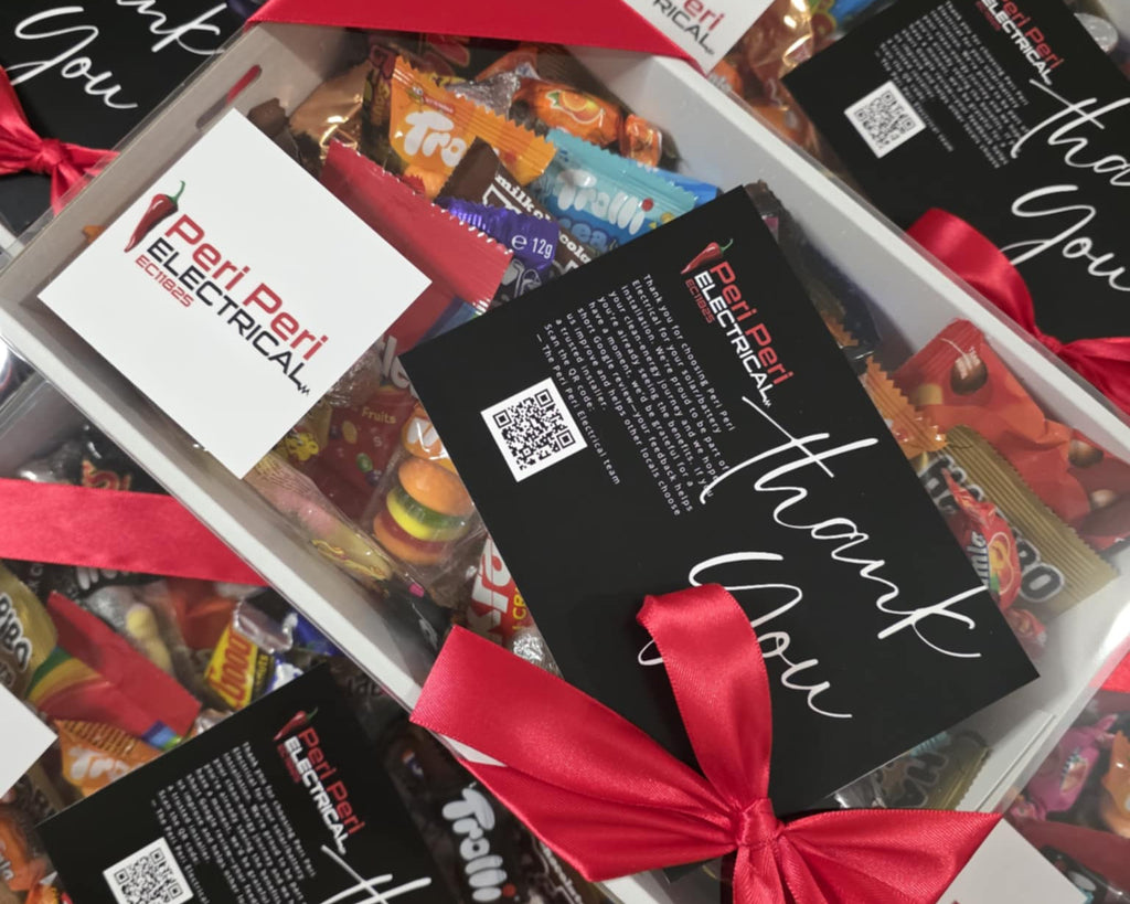 Confetti Box Co corporate snack box with 50 assorted mini lollies, branded sticker label and ribbon — Cadbury, Trolli, Allens