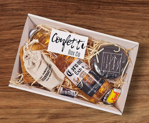 Bearded Guy Gift Box: The perfect gift for the bearded man, featuring a Corona Extra Beer Stubby, Lenx Cubans & Brandy scented soy candle, 3 Mini Hershey's, and Legendary Aussie Harry Beard Oil. This premium beard oil conditions, softens, and promotes healthy beard growth with a natural blend of Aussie ingredients.