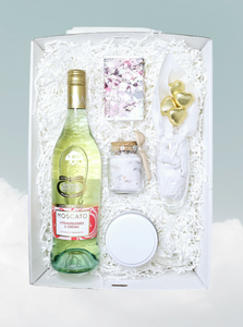 Relaxation & Treats Gift Box: The perfect gift for mum or a special lady, featuring Brown Brothers Strawberries and Cream Moscato (700ml), a wine glass, assorted fragrance candle, Huxter Soap (Australian Made), bath salts, and 4 gold chocolate hearts. A delightful blend of relaxation and indulgence.