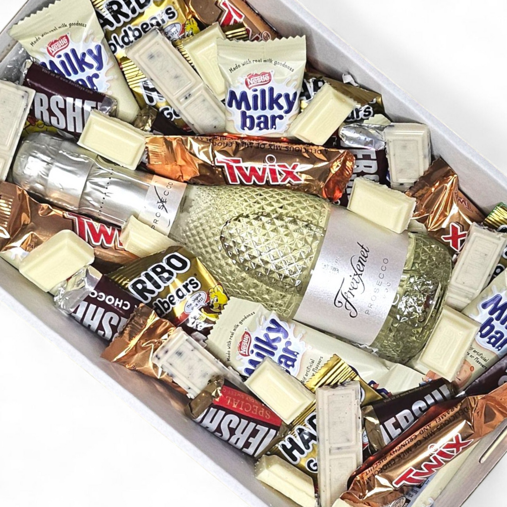 Fun and indulgent prosecco and chocolate gift box featuring a 200ml bottle of Freixenet Prosecco, Twix, Milky Bar, Haribo Bears, Hershey’s Minis, and cookies & cream pieces. Perth gift delivery.
