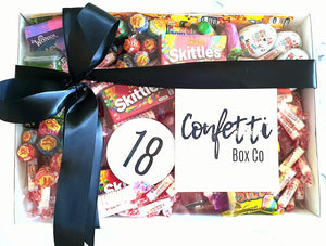 Over 18's Birthday Box – A fun and unique birthday gift featuring Vodka Cruisers, Skittles, Kinder Eggs, Chupa Chups, and more. Customizable with any age. Perfect for sweet lovers who enjoy a little celebration!
