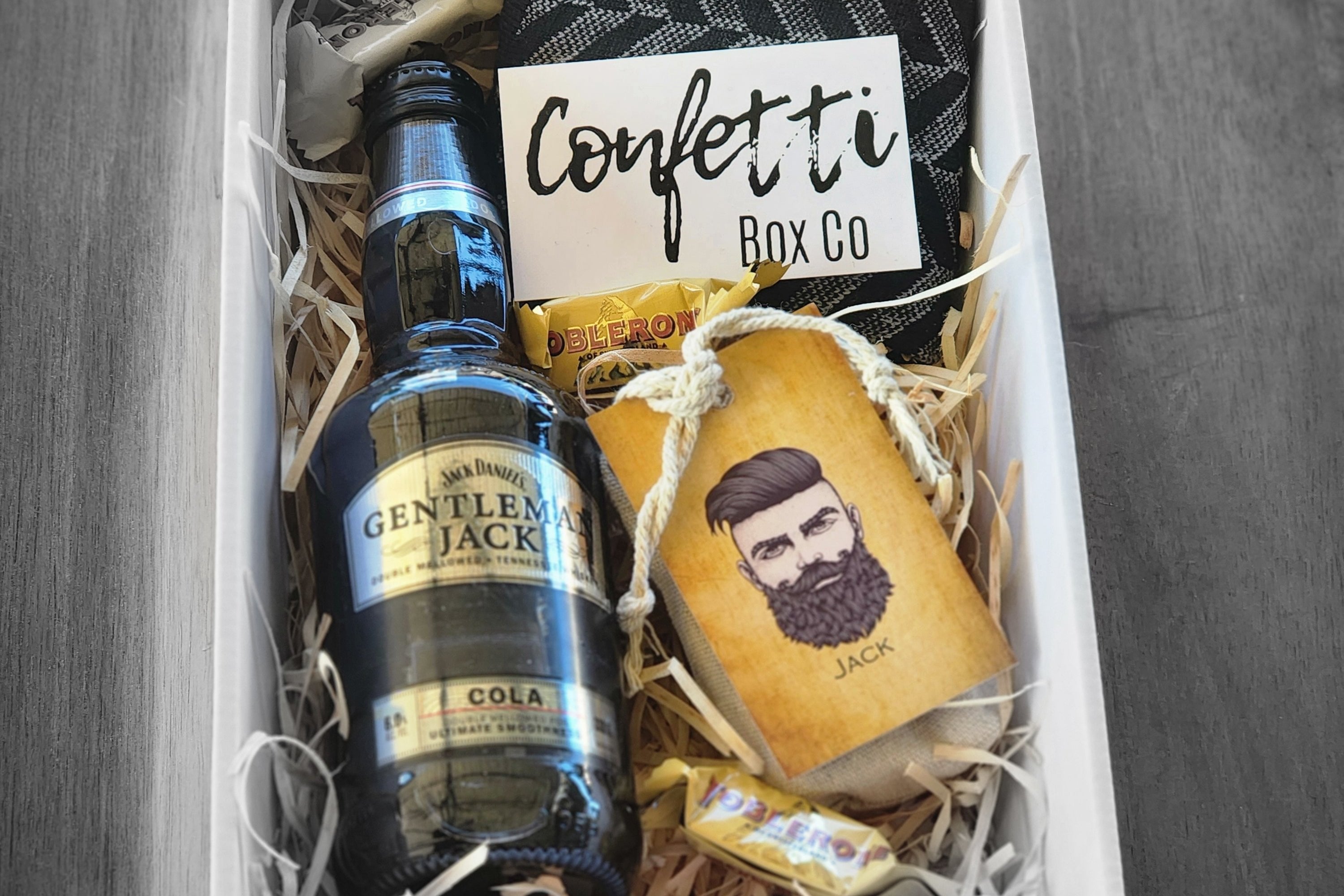 Bearded Guy Gift Box: The ultimate gift for the bearded man, including a Corona Extra Beer Stubby, Lenx Cubans & Brandy scented soy candle, 3 Mini Hershey's, and Legendary Aussie Harry Beard Oil. This high-quality beard oil conditions, softens, and encourages healthy beard growth with a natural blend of premium Aussie ingredients.